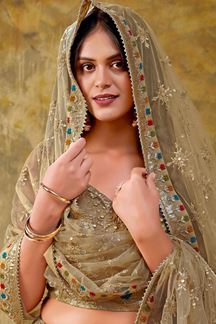 Picture of Impressive Golden Premium Net Designer Indo-Western Lehenga Choli for Engagement and Sangeet