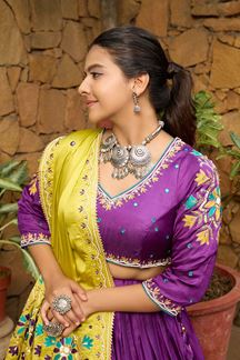 Picture of Spectacular Purple and Pista Designer Navratri Lehenga Choli for Garba Raas 